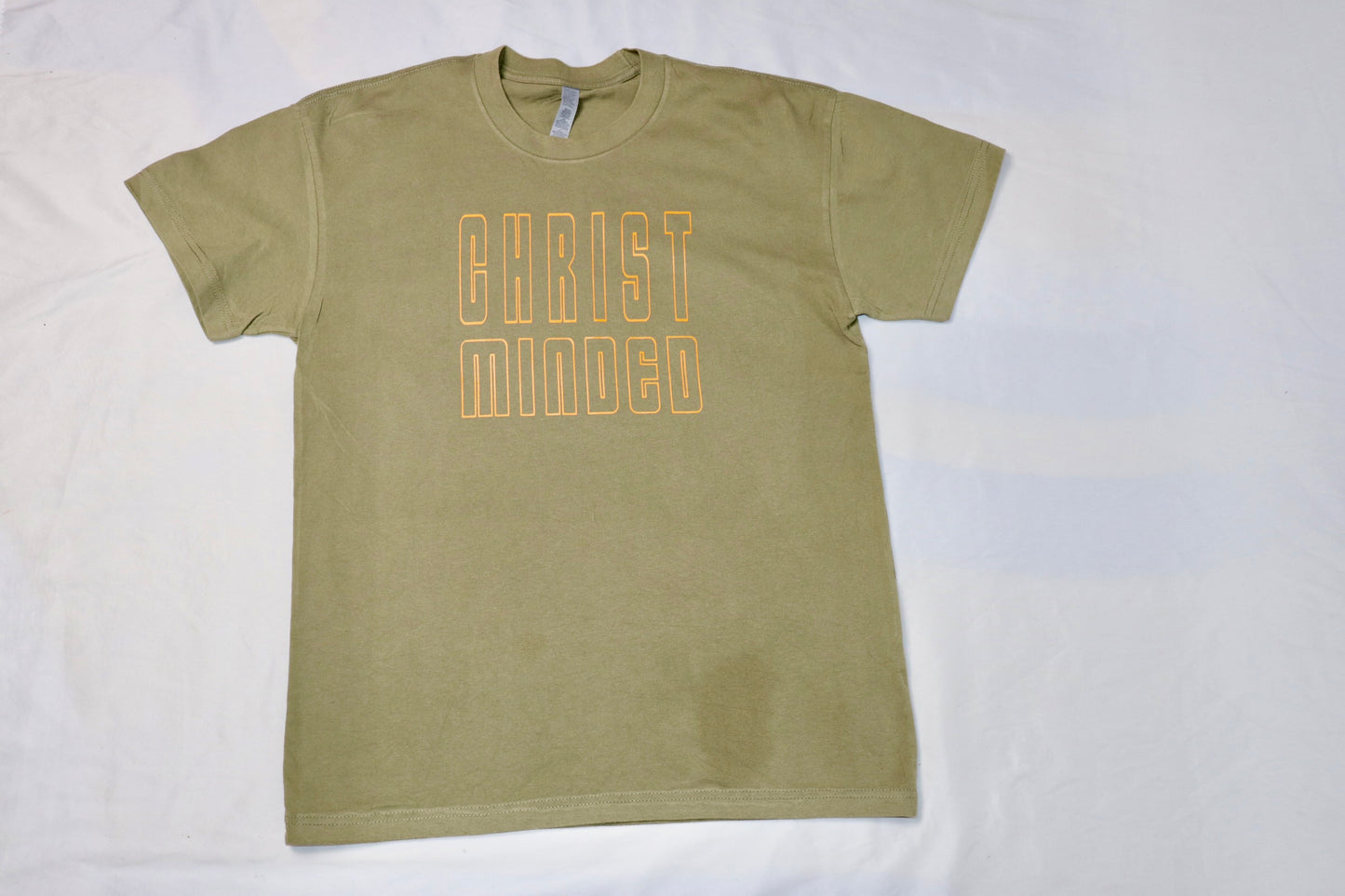  olive christian t-shirt with christ minded outlined front design in orange letters